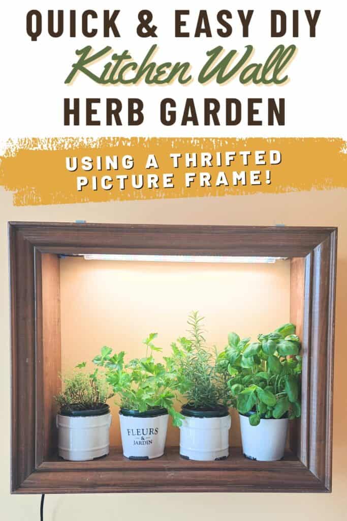 Finished project showing vertical herb garden in the kitchen that is made out of a thrifted picture frame.