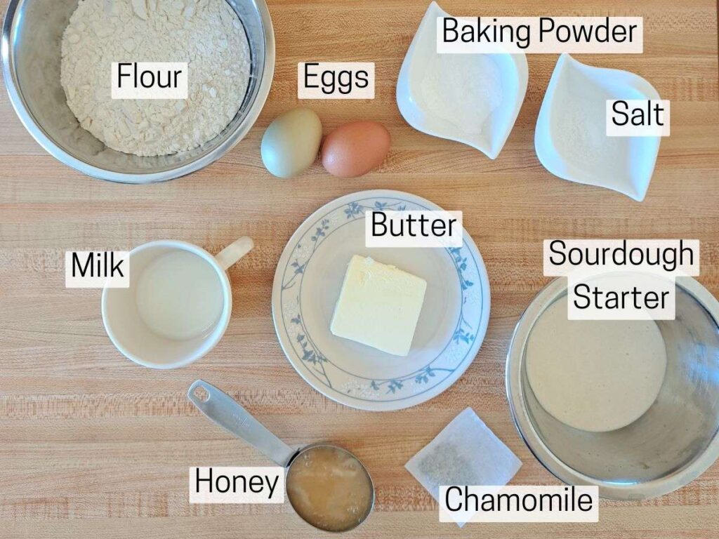 Ingredients laid out to make chamomile and honey sourdough discard muffins.