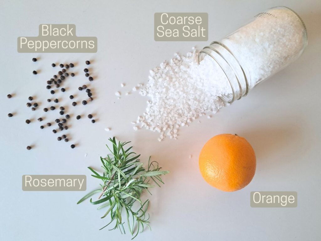 Ingredients laid out to make a rosemary orange finishing salt.